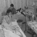 Patient on dialysis at home and speaking on the phone